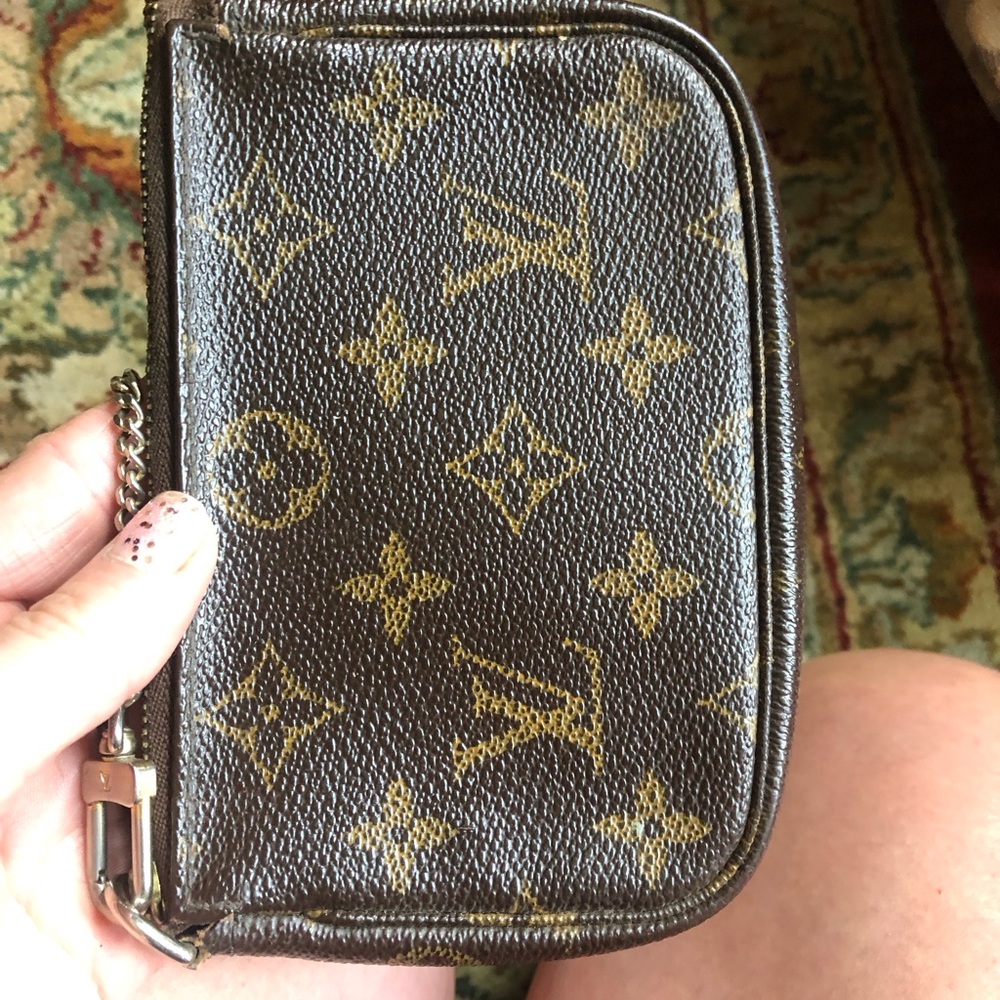 Louis Vuitton authentic mini pouchette with metal strap